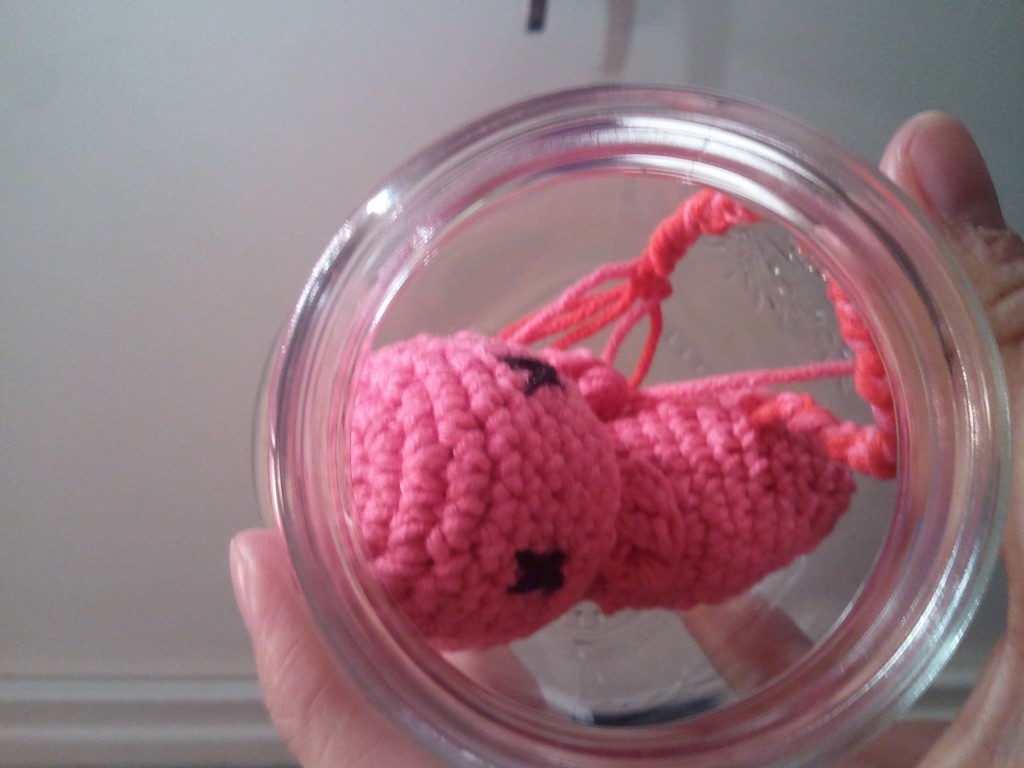 crochet amigurumi fetus in a jar