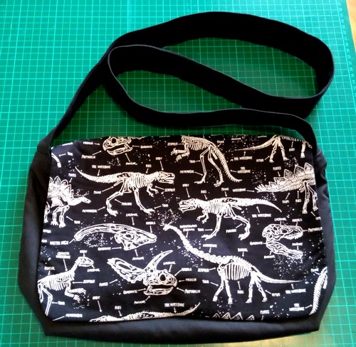 Sewing dinosaurs messenger bag